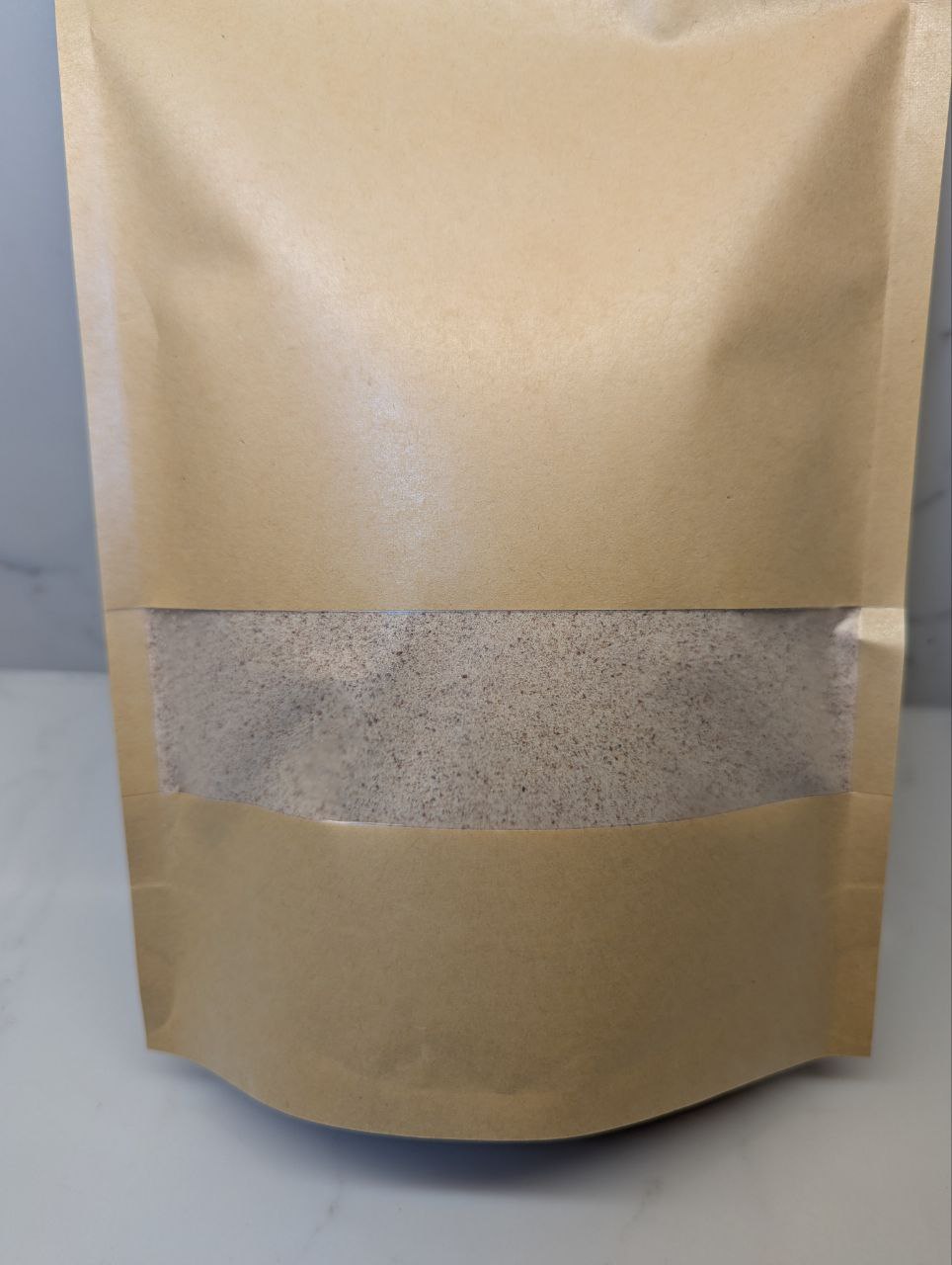 Almond protein powder in 500 gr package back